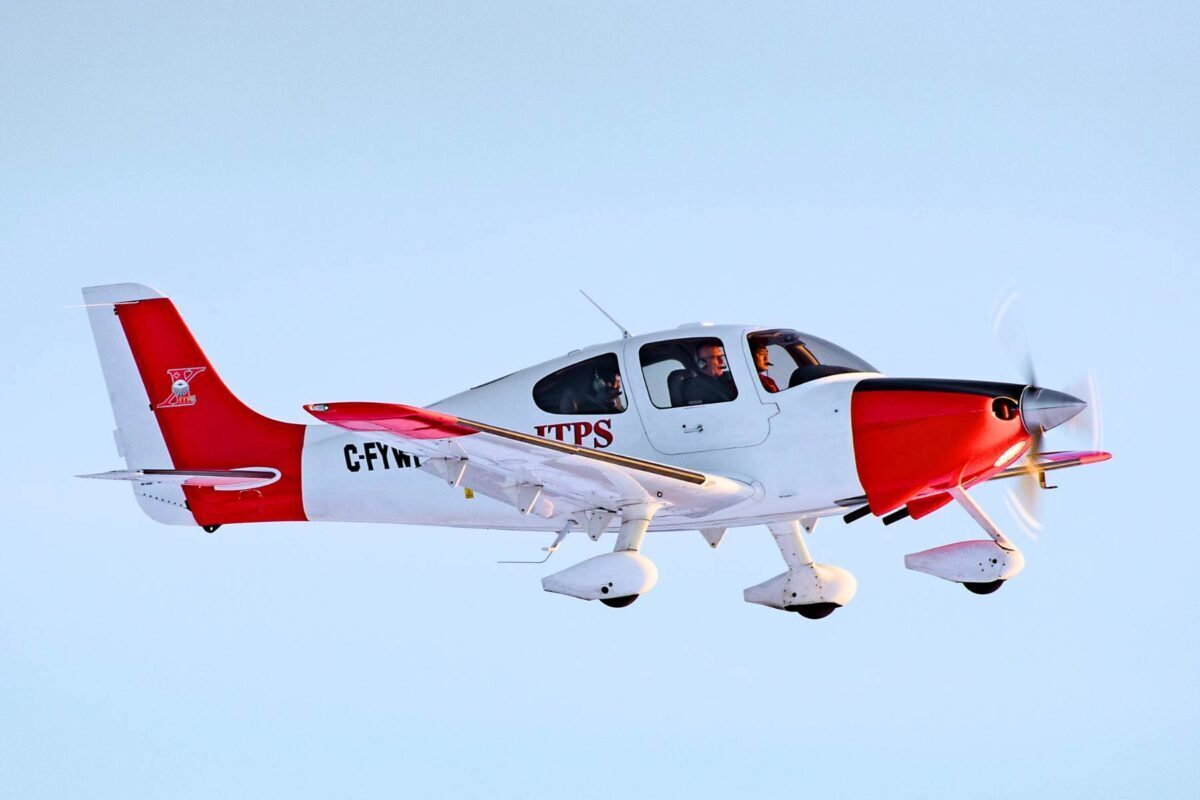 Cirrus SR22 aircraft flying side angle