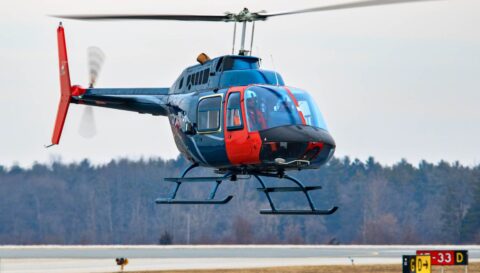 Rotary wing Bell 206 hovering