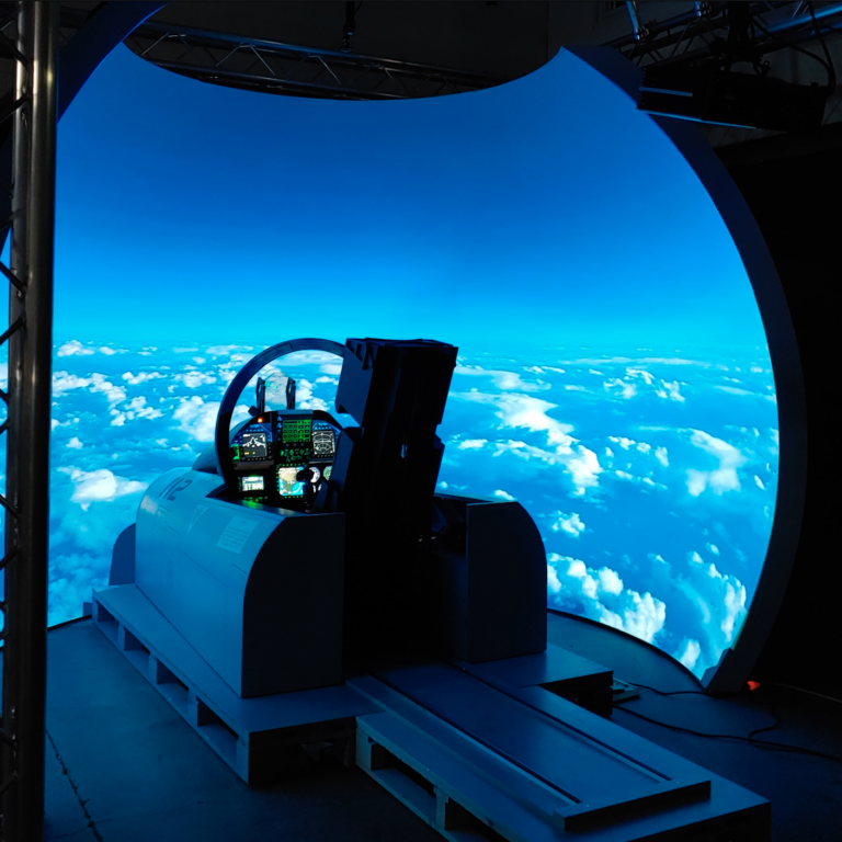 F-18 aircraft simulator cockpit and dome.