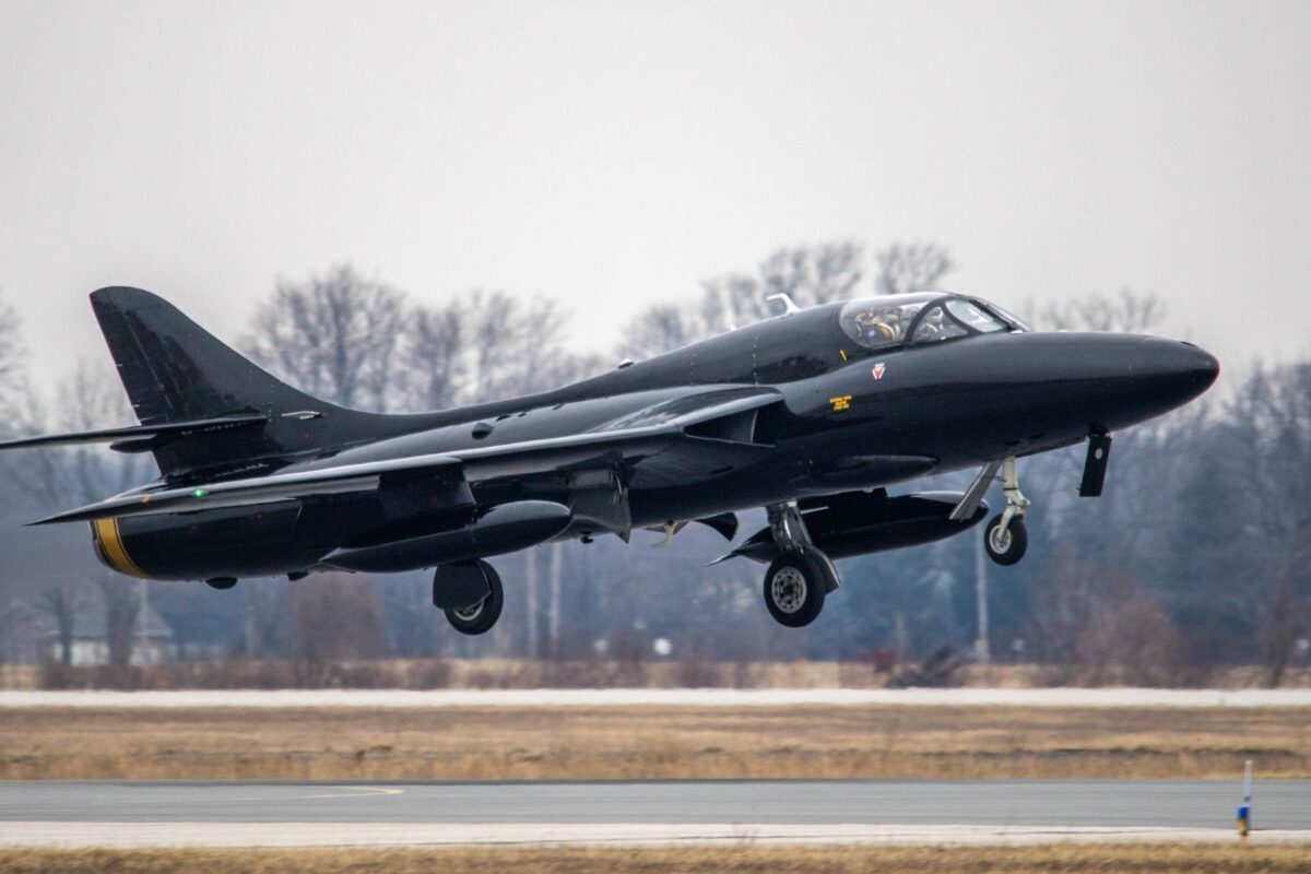 Hawker Hunter taking off from runway