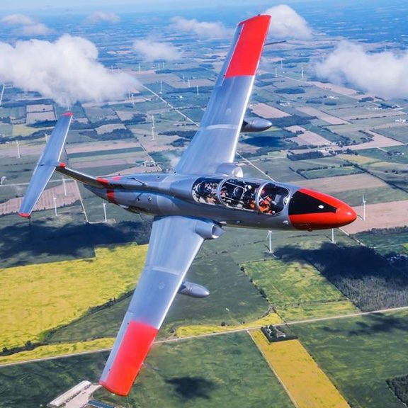 ITPS L-29 flying over open farm fields in London, Ontario.