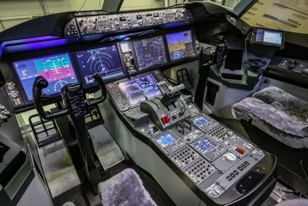 B787 aircraft simulator cockpit at International Test Pilots School
