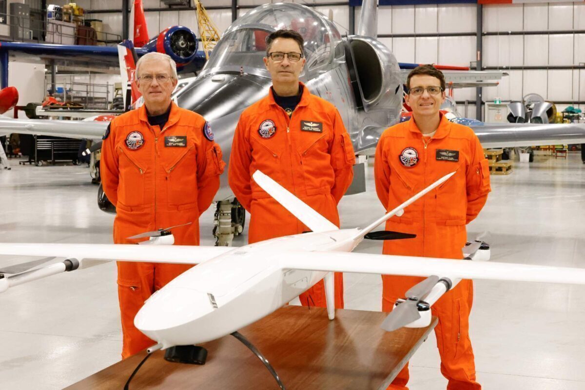 thre test pilot instructors stand behind SkyWhale mini
