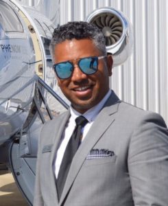 Rene Changtin Business Development Manager wearing grey suit.