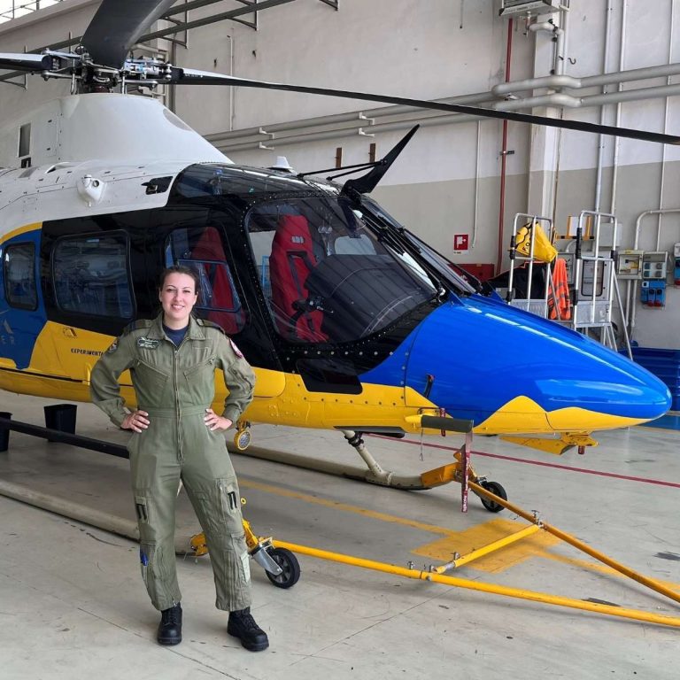 student with yellow and blue helicopter