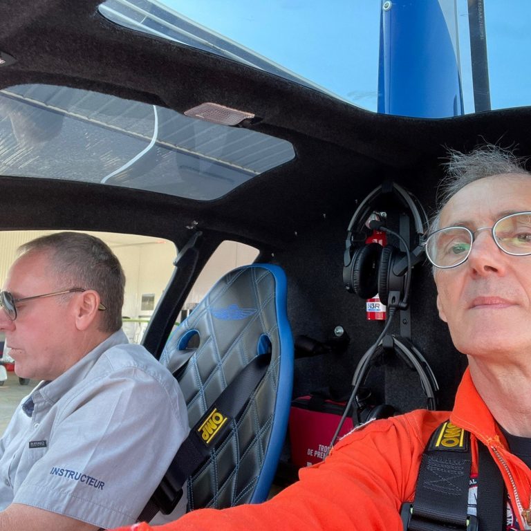 flight test instructors inside gyrocopter cockpit