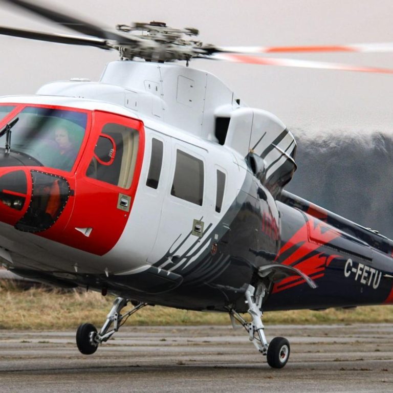 Sikorsky S-76 taking off from runway