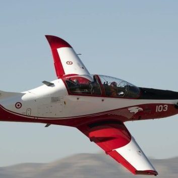 Hurkus red and white plane in-flight