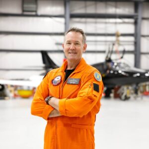 Dave Lohse in orange flight suit