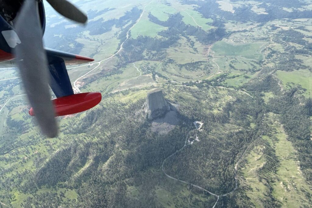 1 flying above mountain in HU-16