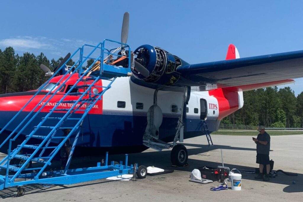 2 Blue ladder leading up to HU-16 propeller