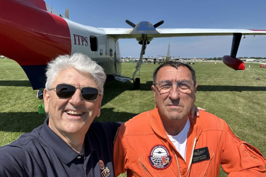 2 Giorgio Clementi and Stan Constantin stand in front of HU-16 Albatross