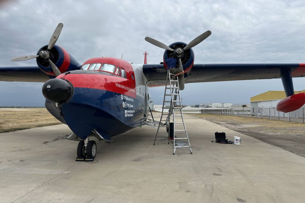 3 Todd Polcher working on HU-16 propeller