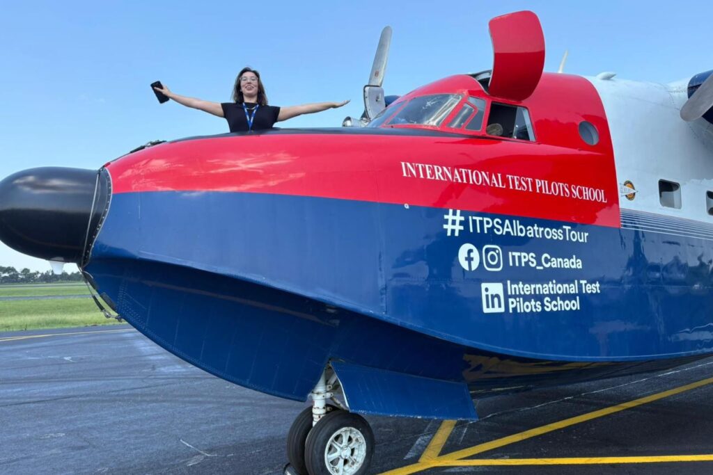 3 Airbus employee outside of HU-16 nose