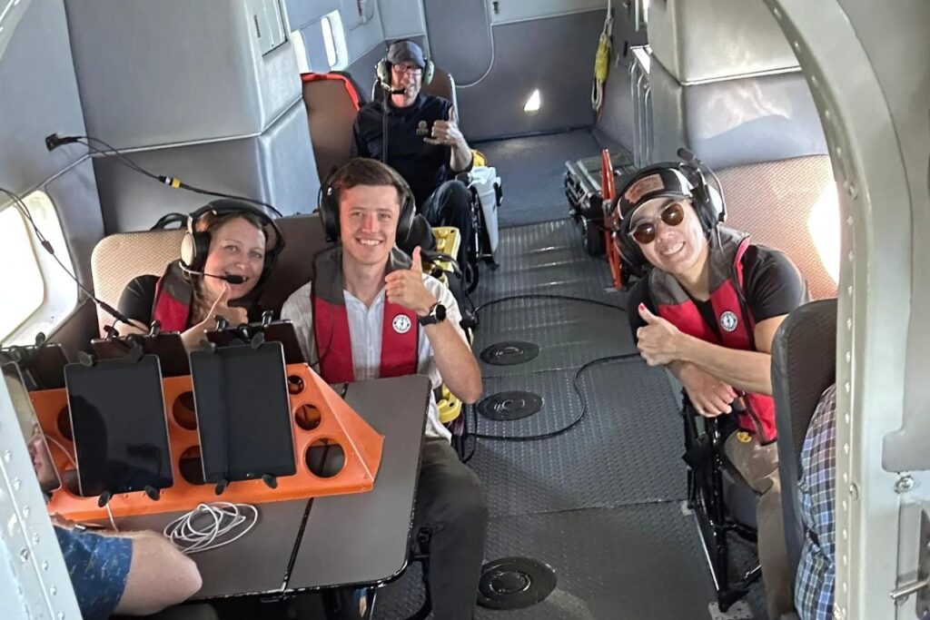 3 ITPS team inside HU-16 at FTE stations