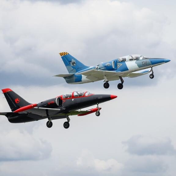 two L39 jet aircraft flying in formation