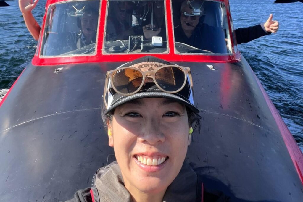 4 Jen Uchida out of HU-16 hatch with HU-16 test pilots in cockpit