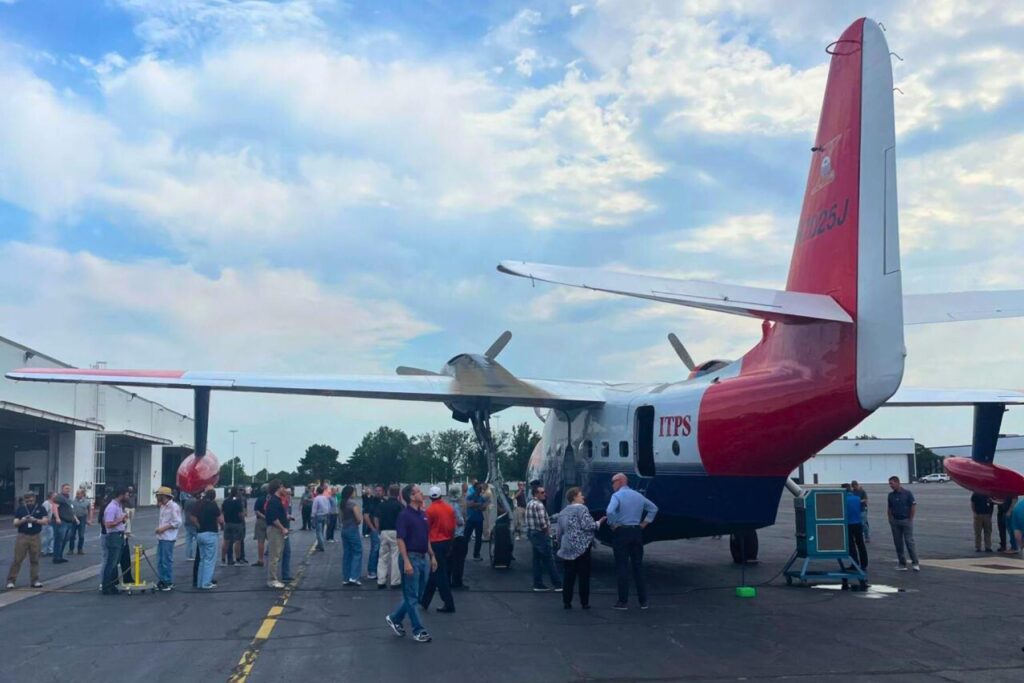 5 HU-16 Albatross from behind with crowd surrounding it