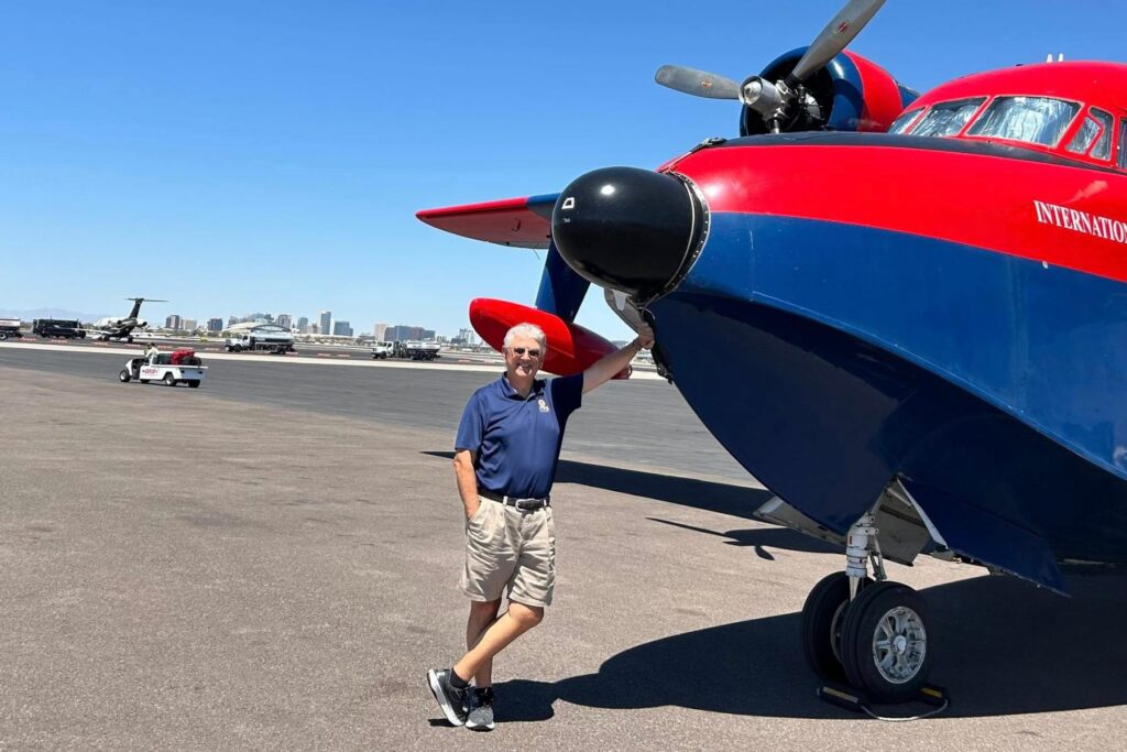 6 Giorgio Clementi with his hand on the nose of HU-16