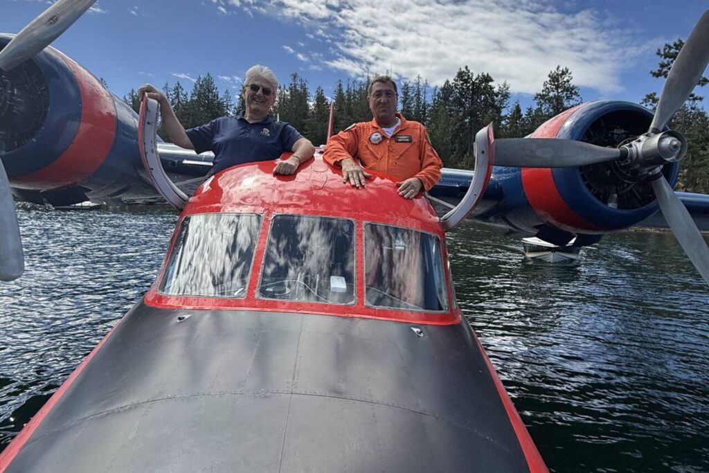 9 Giorgio Clementi and Stan Constantin stand outside of HU-16 hatch