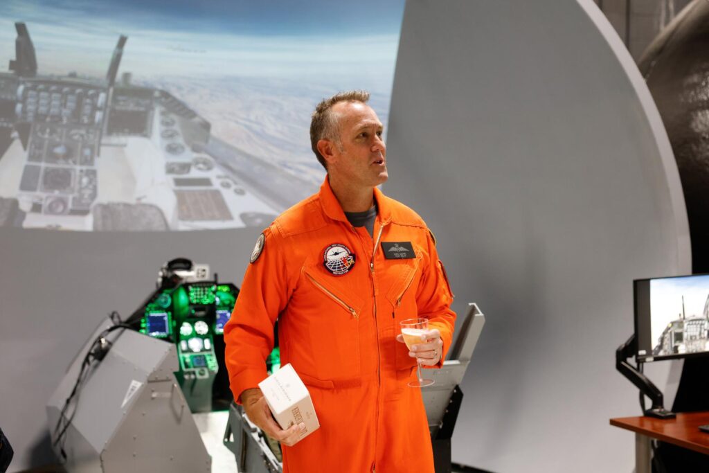 6 Dave Lohse addresses crowd in simulation centre