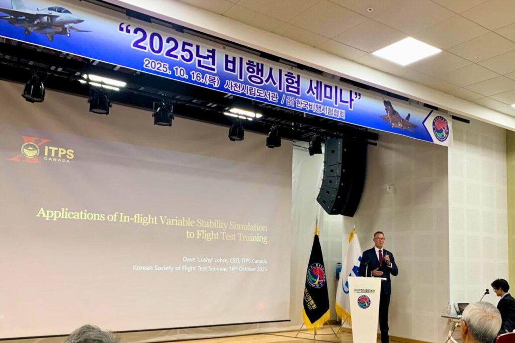 2 Dave Lohse, CEO of ITPS Canada, on podium giving technical presentation at Korean Society of Flight Test Seminar