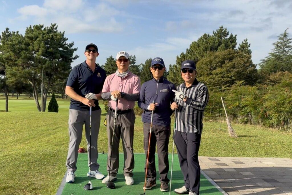 4 Dave Lohse with Korean Society of Flight Test Seminar attendees on golf course