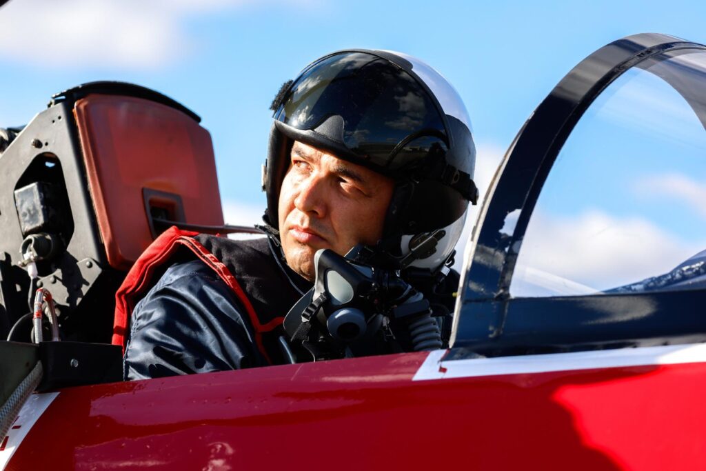 yes (2) ITPS test pilot student in dramatic lighting jet cockpit