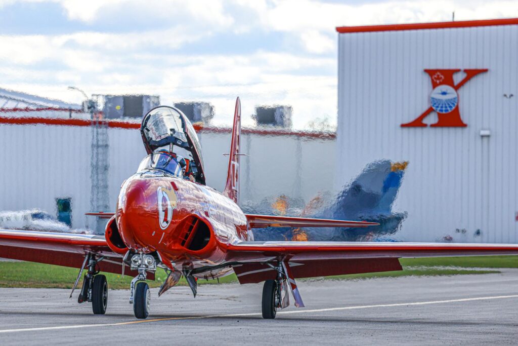yes (4) T-33 T-Bird in front of ITPS Canada hangar