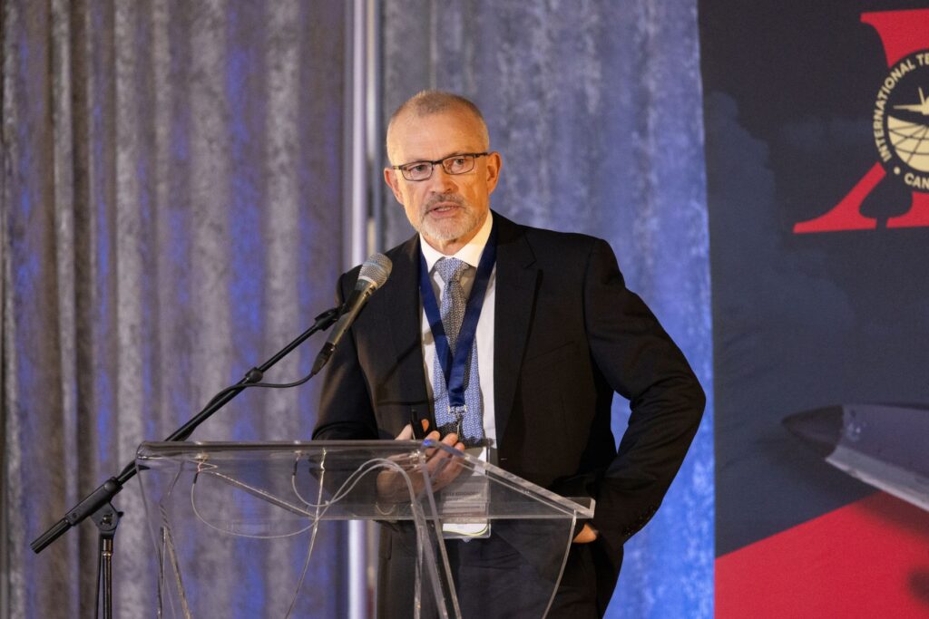 presenter at ITPS Canada standing at podium