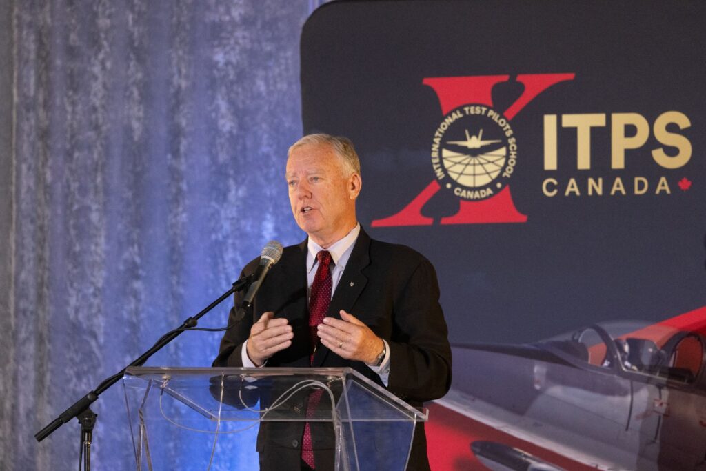 ITPS 13th annual flight test seminar presenter at podium