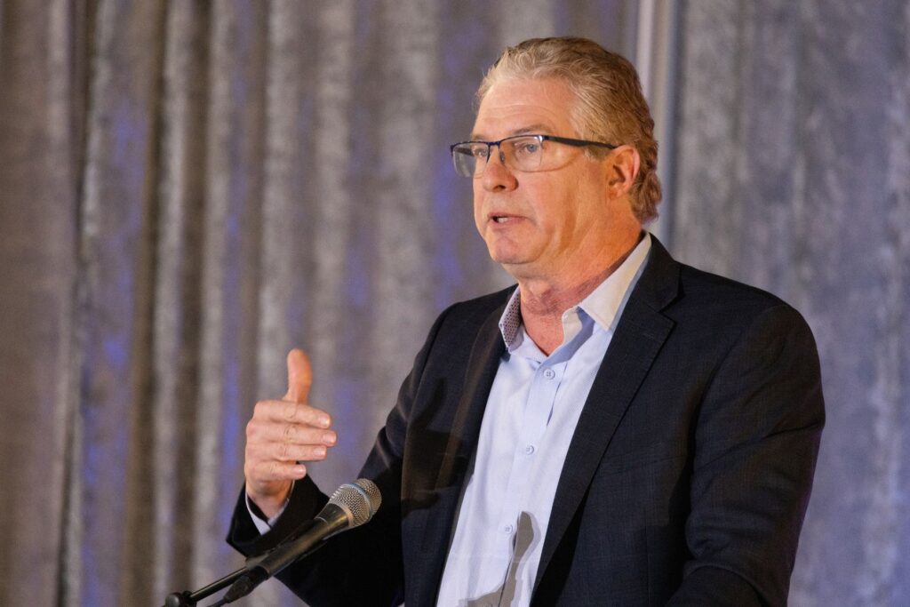 ITPS presenter talking to crowd at seminar