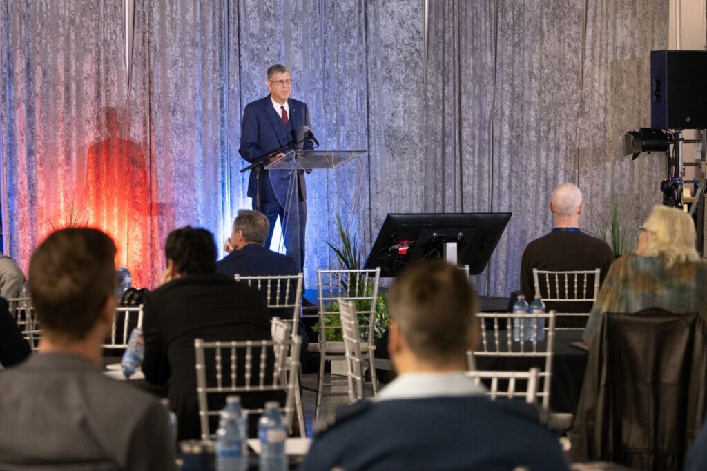 Ken Katz presenting to audience at ITPS flight test seminar 2025