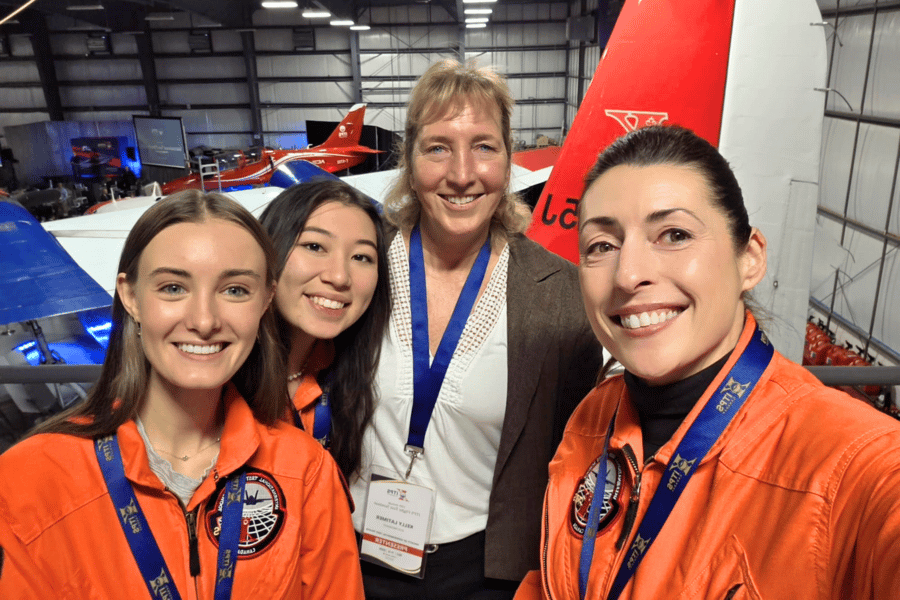 Website post 1 Kelly Latimer, SETP president, with ITPS students in hangar