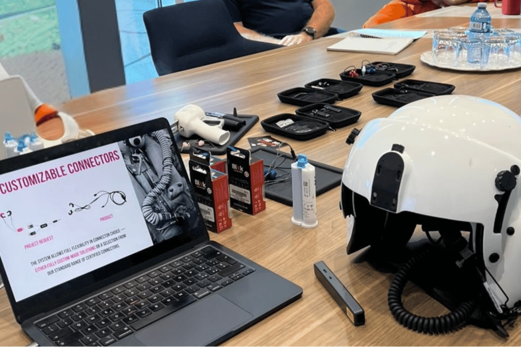 yes Crai S.p.A. audiology equipment on desk with aviation helmet