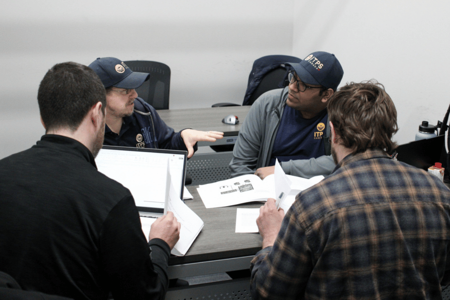 yes (6) ITPS team working together at table