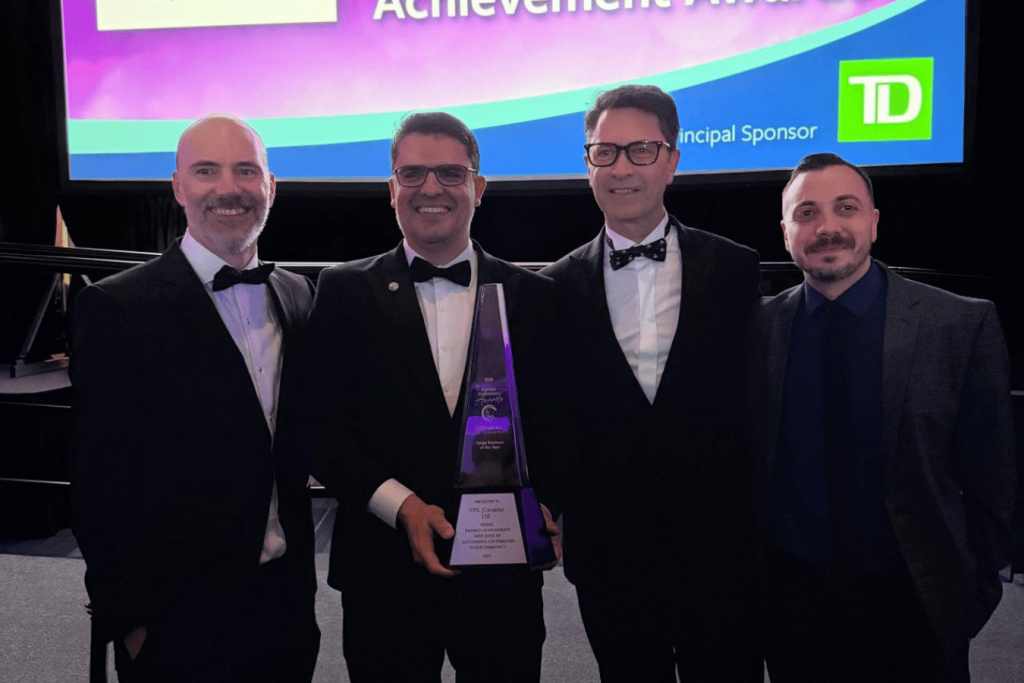 ITPS leadership team holding trophy