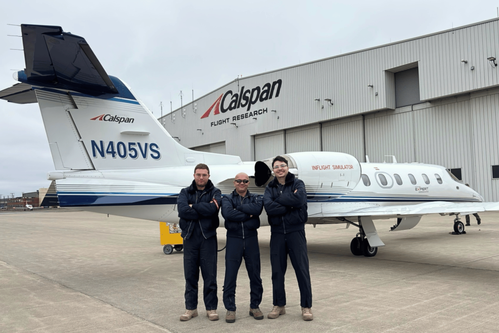 Caner, Soner, Salih three ITPS students standing in front of Variable Stablility System Jet at Calspan Flight Research centre