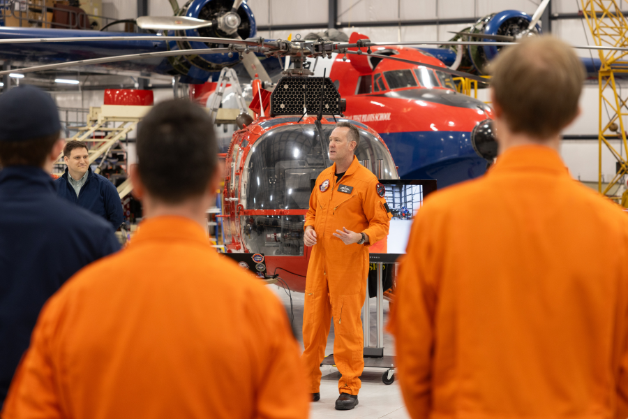 ITPS CEO Dave Lohse talking to employees in hangar