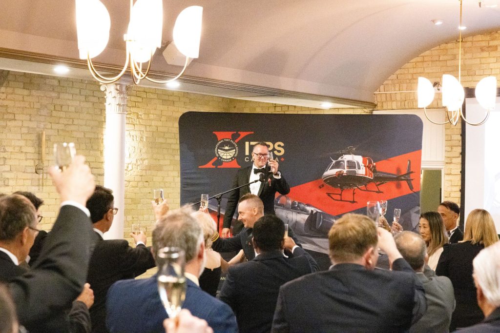 1781829987519 Dave Lohse, CEO of ITPS canada, raises glass to audience of attendees
