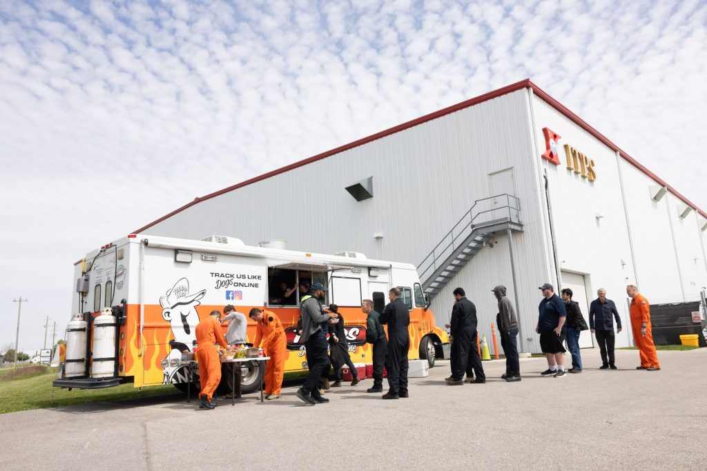 yes ITPS Staff, students and instructors in line for food truck in front of ITPS hangar