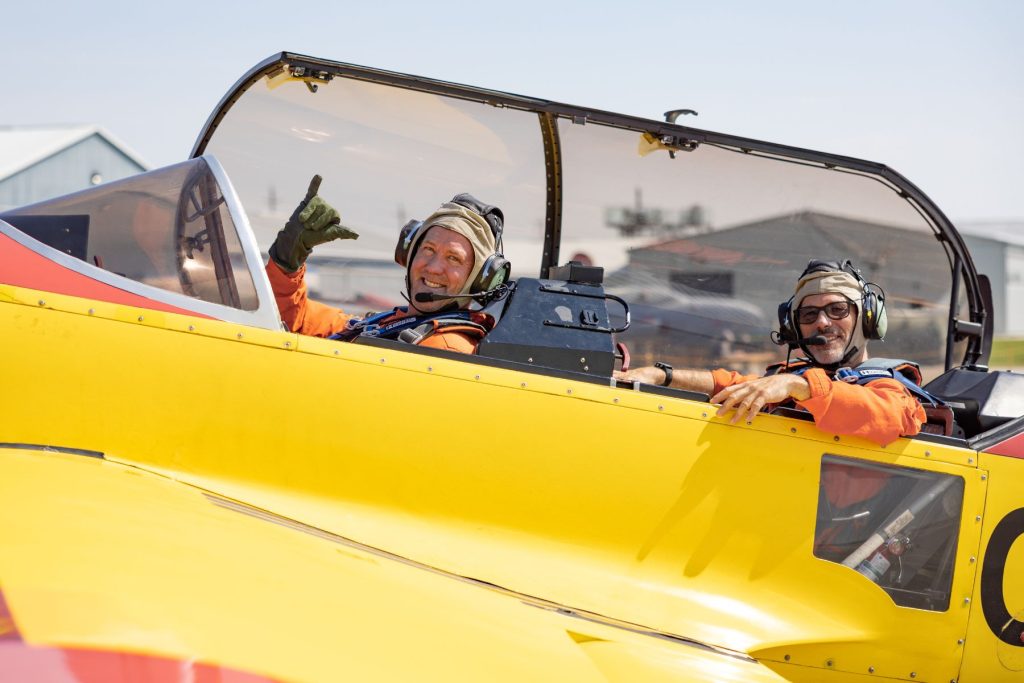 Dave Lohse and Williams Grac in Sukhoi SU-29 cockpit