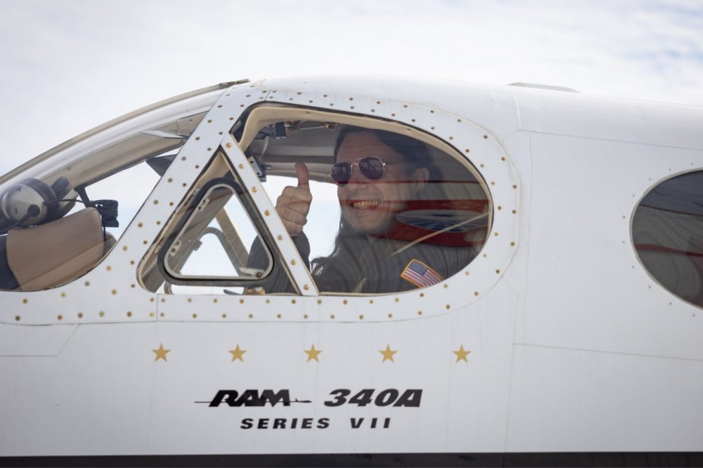 2 Honeywell Aerospace test pilot in ITPS plane cockpit
