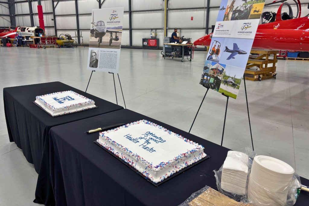 3 2 cakes on tables in hangar