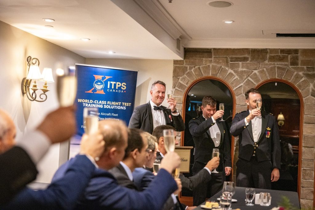 1786564715990 Dave Lohse, CEO, and ITPS Fixed wing students EASA CAT-1 raising glass for toast