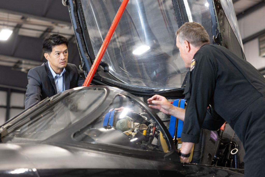 2 Dave Lohse with RSAF visitor talking over Hawker Hunter cockpit