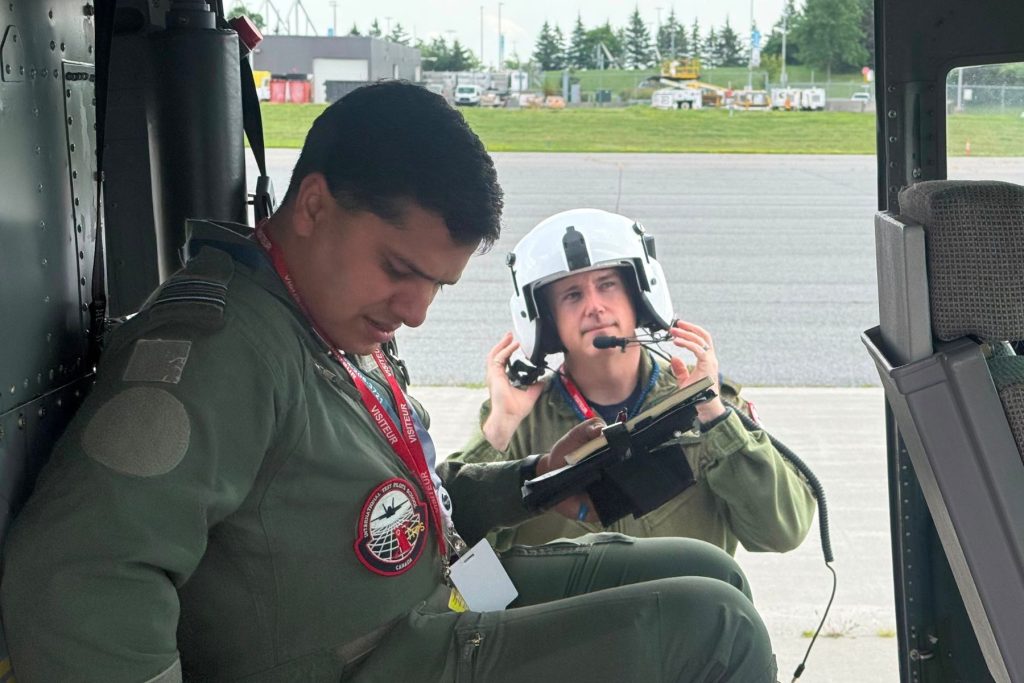 ITPS RW FTE in cockpit of NRC VSS helicopter
