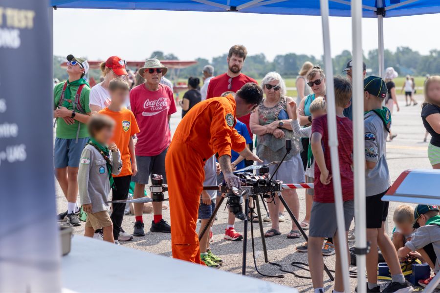Adam Debevc giving demonstration to spectators around drones
