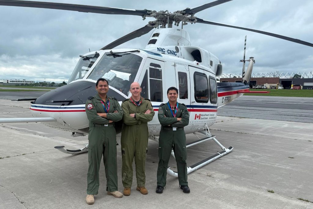 ITPS students in front of National Research Council Canada VSS helicopter