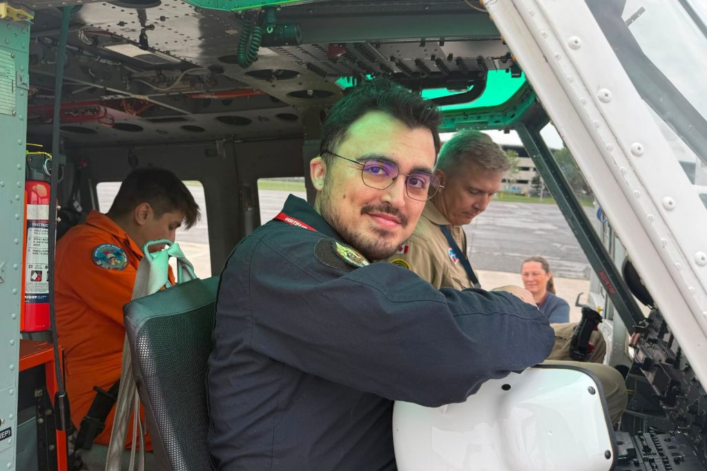 ITPS students in NRC Canada Variable stability system helicopter cockpit